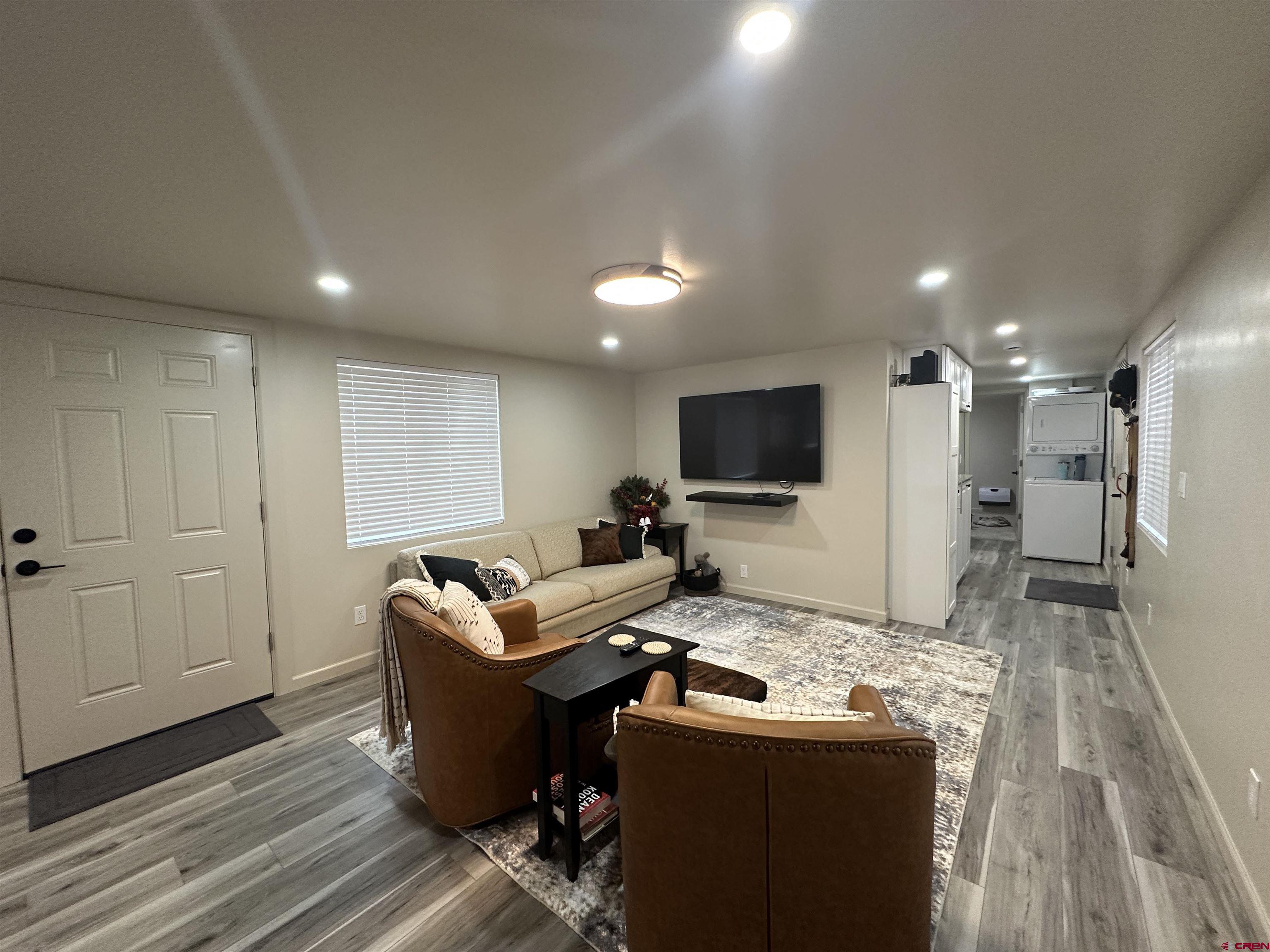 40 Hidden Lane Durango, CO 81303 - Photo 15 of 38 a living room with furniture and a flat screen tv