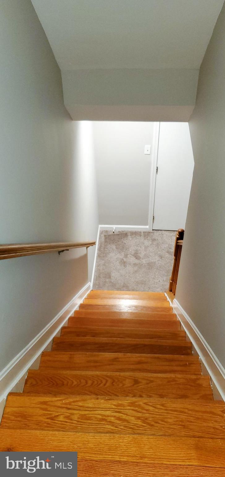 8857 Ritchboro Road District Heights, MD 20747 - Photo 25 of 43 Basement Staircase