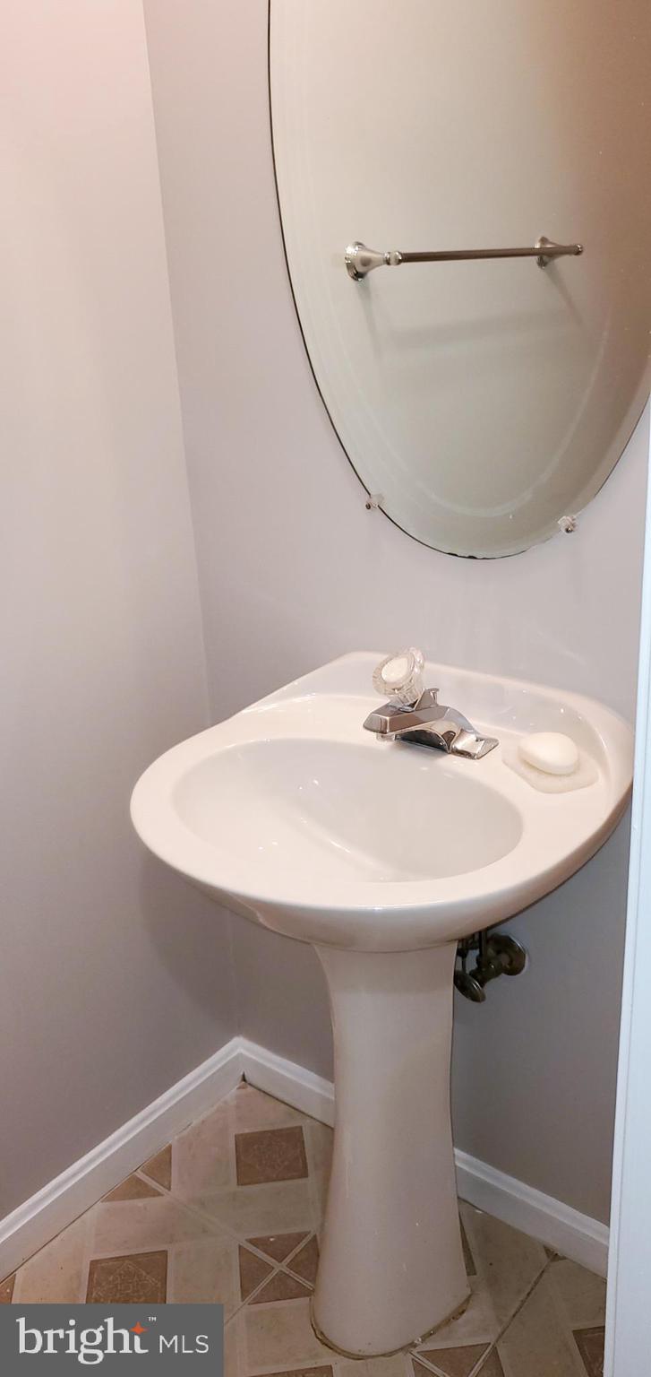 8857 Ritchboro Road District Heights, MD 20747 - Photo 28 of 43 Basement Powder Room