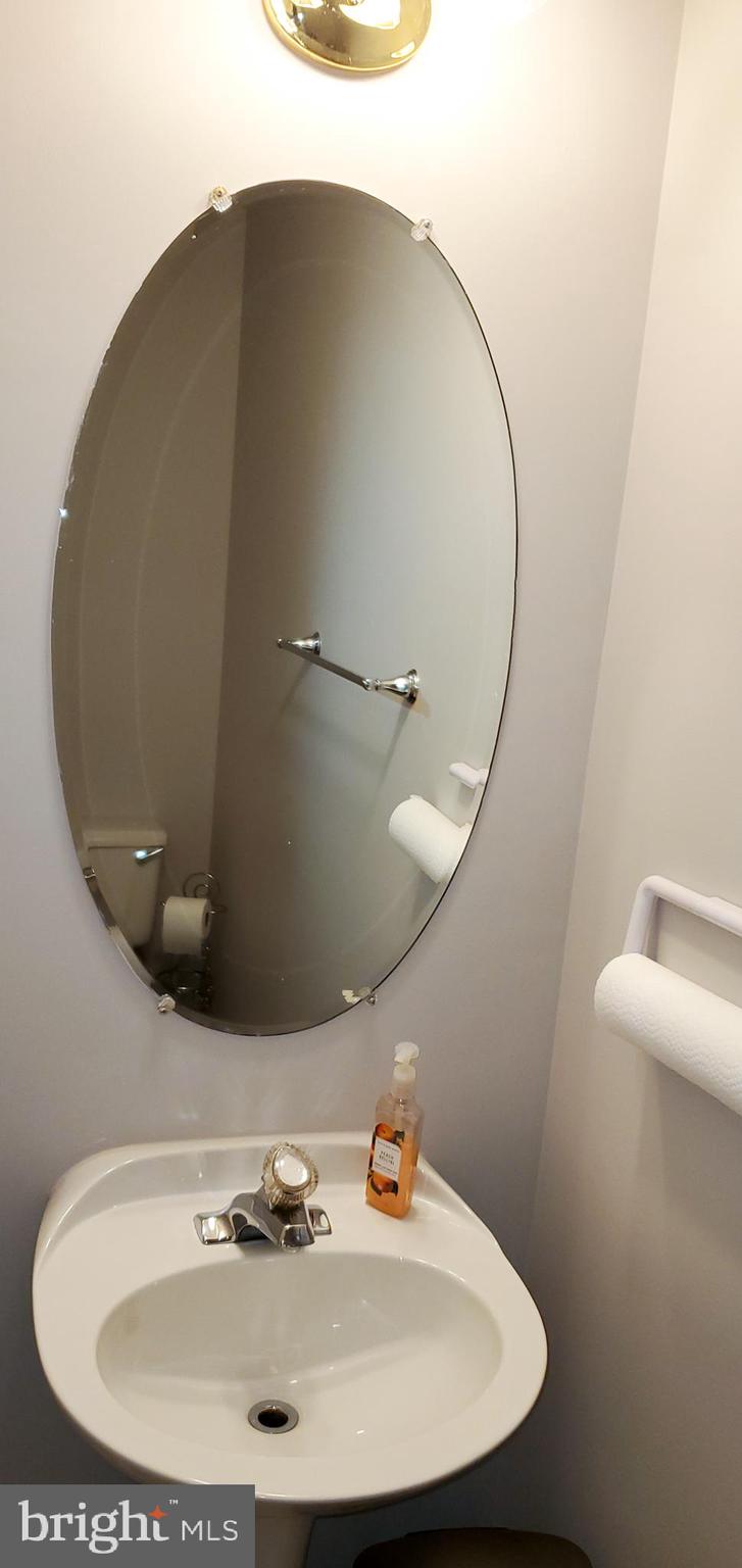 8857 Ritchboro Road District Heights, MD 20747 - Photo 5 of 43 Main Level Powder Room