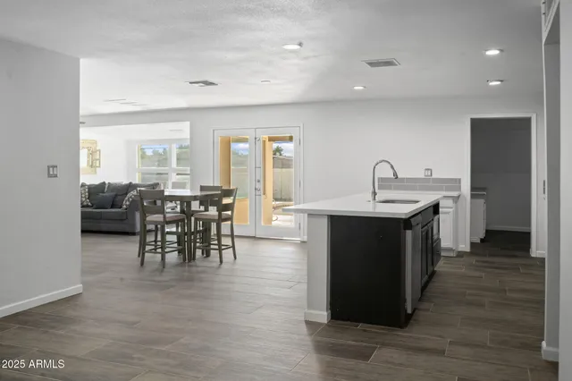 a kitchen with counter top space and sink