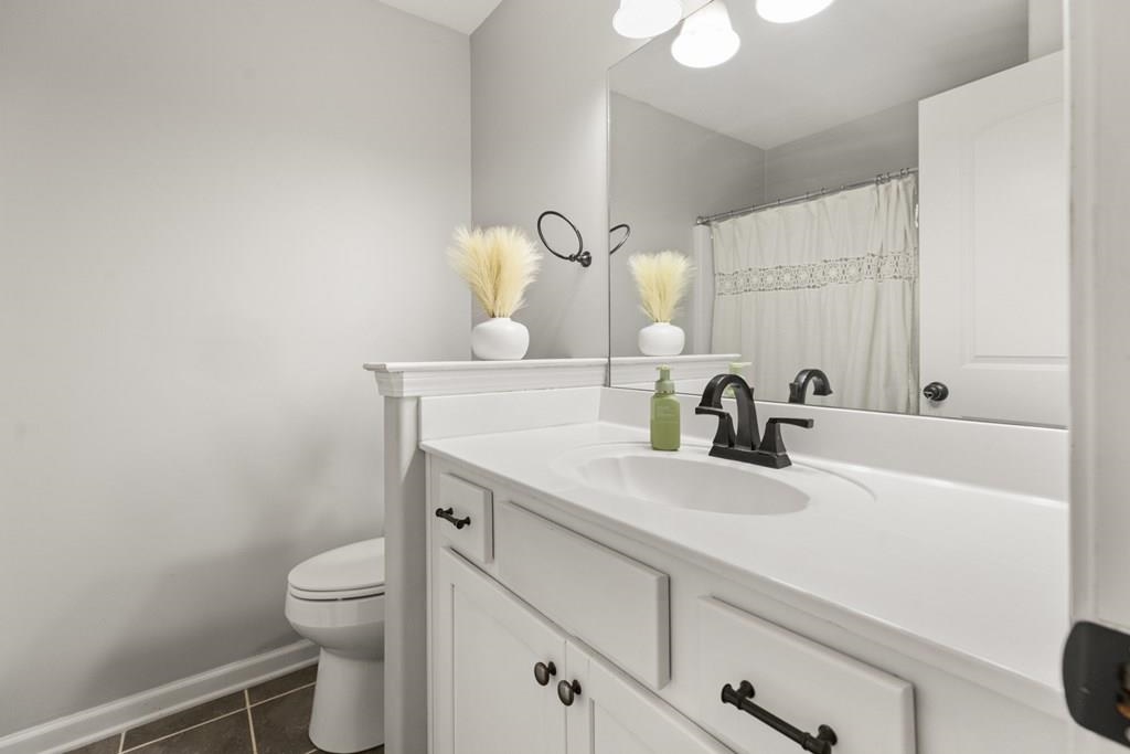 13854 Highway 70 Proctor, AR 72376 - Photo 19 of 31 a bathroom with a sink and a toilet