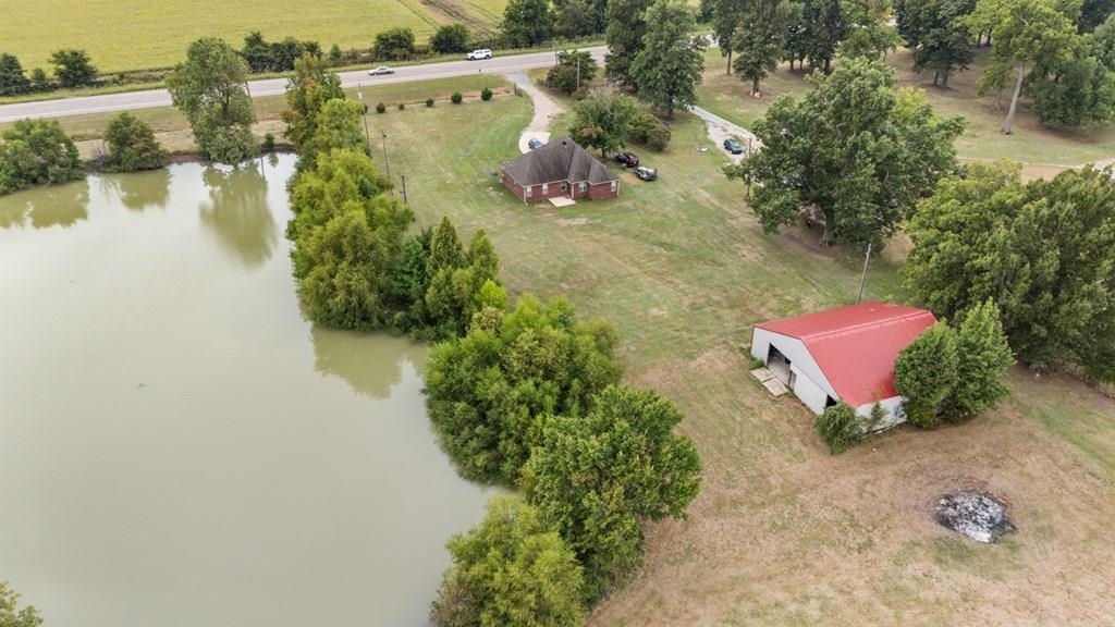 13854 Highway 70 Proctor, AR 72376 - Photo 29 of 31 an aerial view of a house with outdoor space and lake view