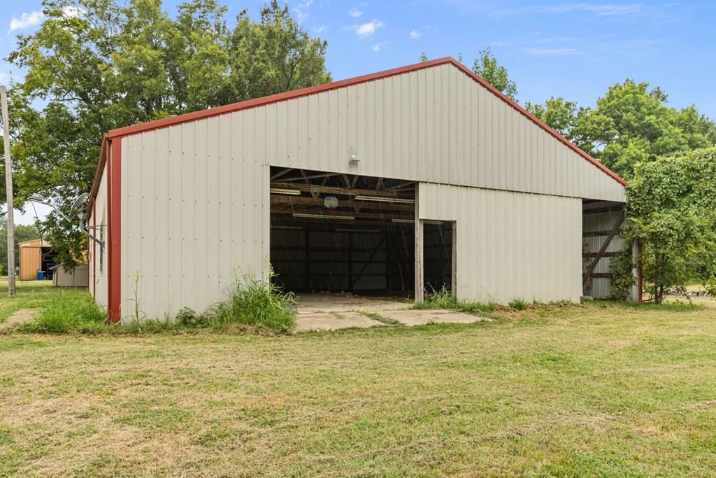 13854 Highway 70 Proctor, AR 72376 - Photo 6 of 31 a view of a backyard of the house