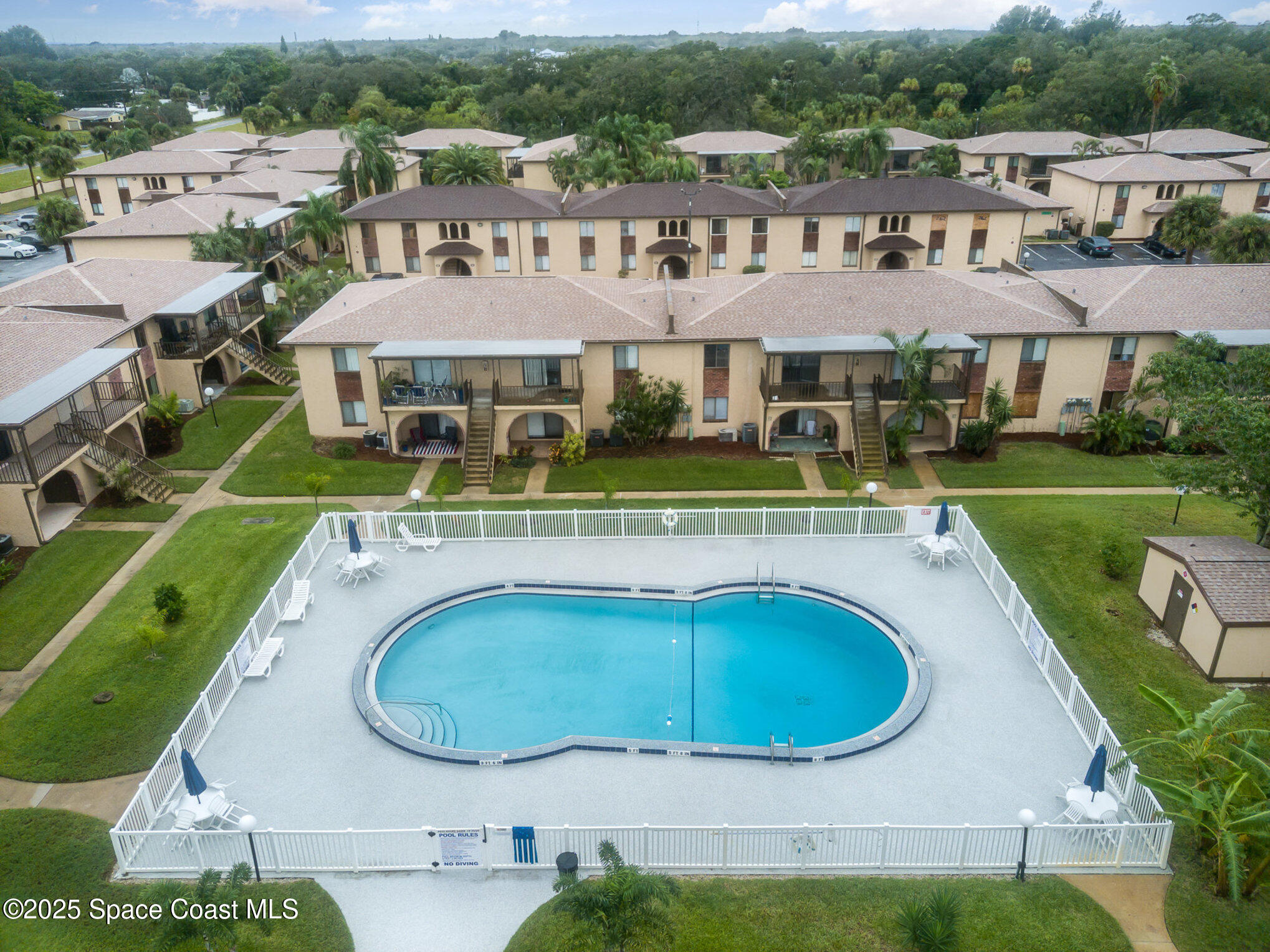 109 San Paulo Circle, Unit 15109 West Melbourne, FL 32904 - Photo 28 of 30 an aerial view of a house with a yard
