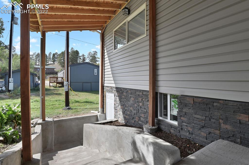 24365 Elbert Road Elbert, CO 80106 - Photo 17 of 19 a outdoor space with patio