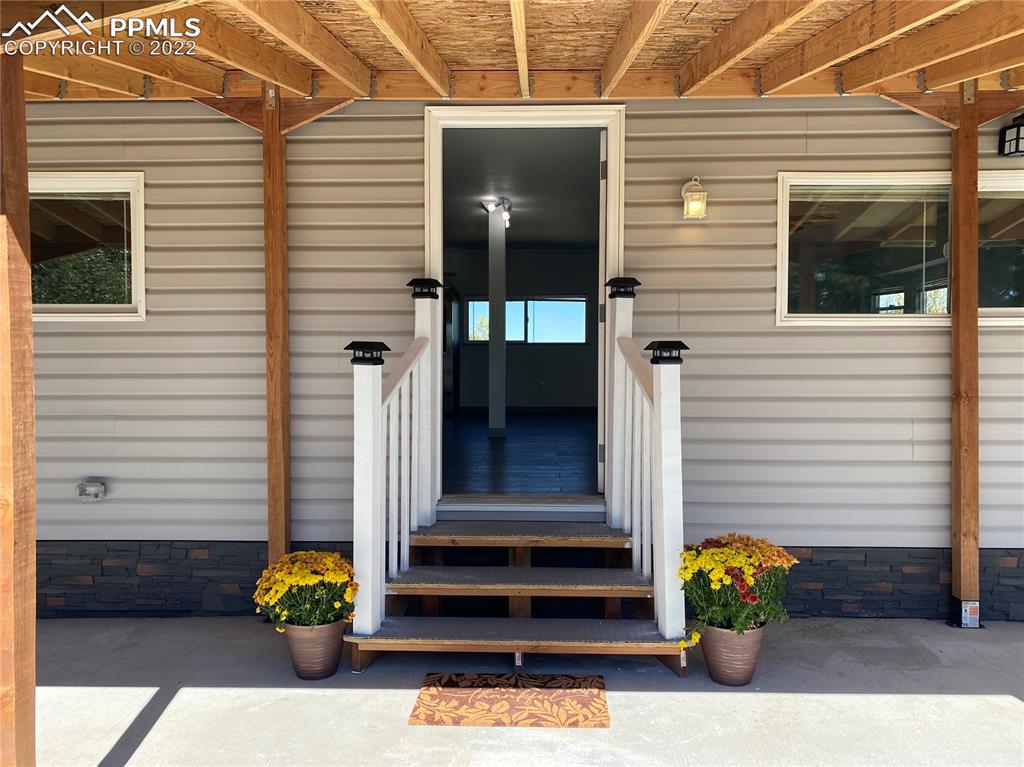 24365 Elbert Road Elbert, CO 80106 - Photo 2 of 19 a view of a entryway door front of house