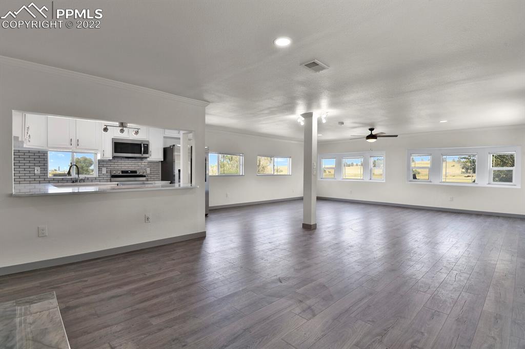 24365 Elbert Road Elbert, CO 80106 - Photo 6 of 19 a view of a kitchen and a stove top oven