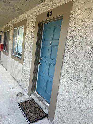 a view of a porch with wooden floor
