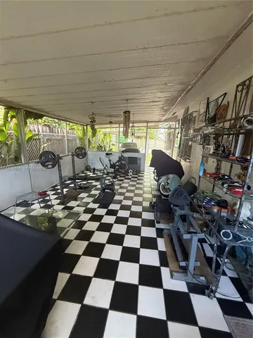 a bathroom with a sink toilet and a mirror