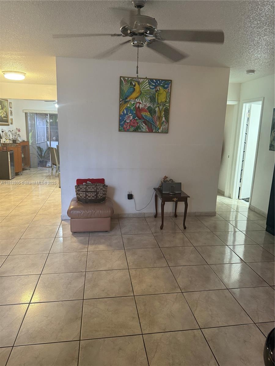 11472 Southwest 4th Street Sweetwater, FL 33174 - Photo 26 of 65 a view of a livingroom with furniture and a window