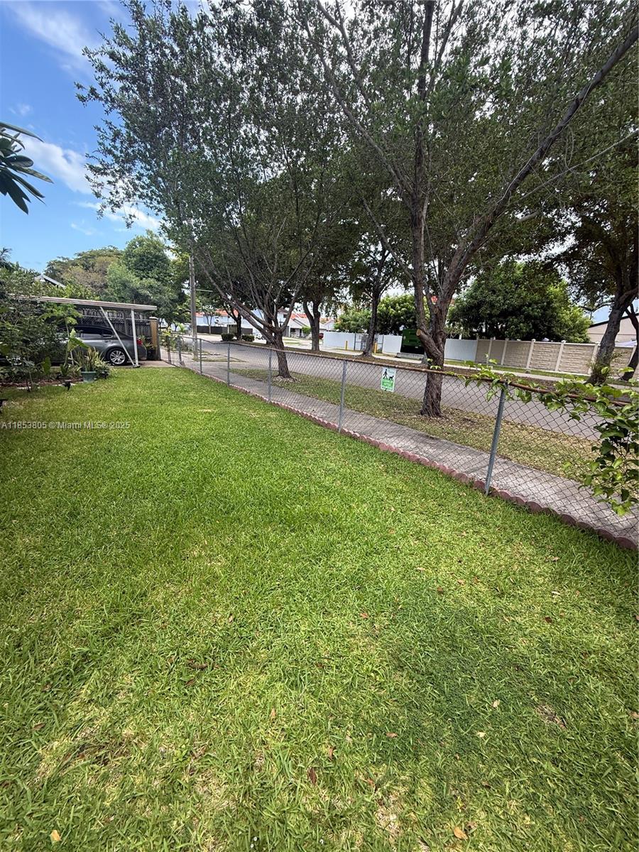 11472 Southwest 4th Street Sweetwater, FL 33174 - Photo 8 of 65 a park with lots of swings and slides