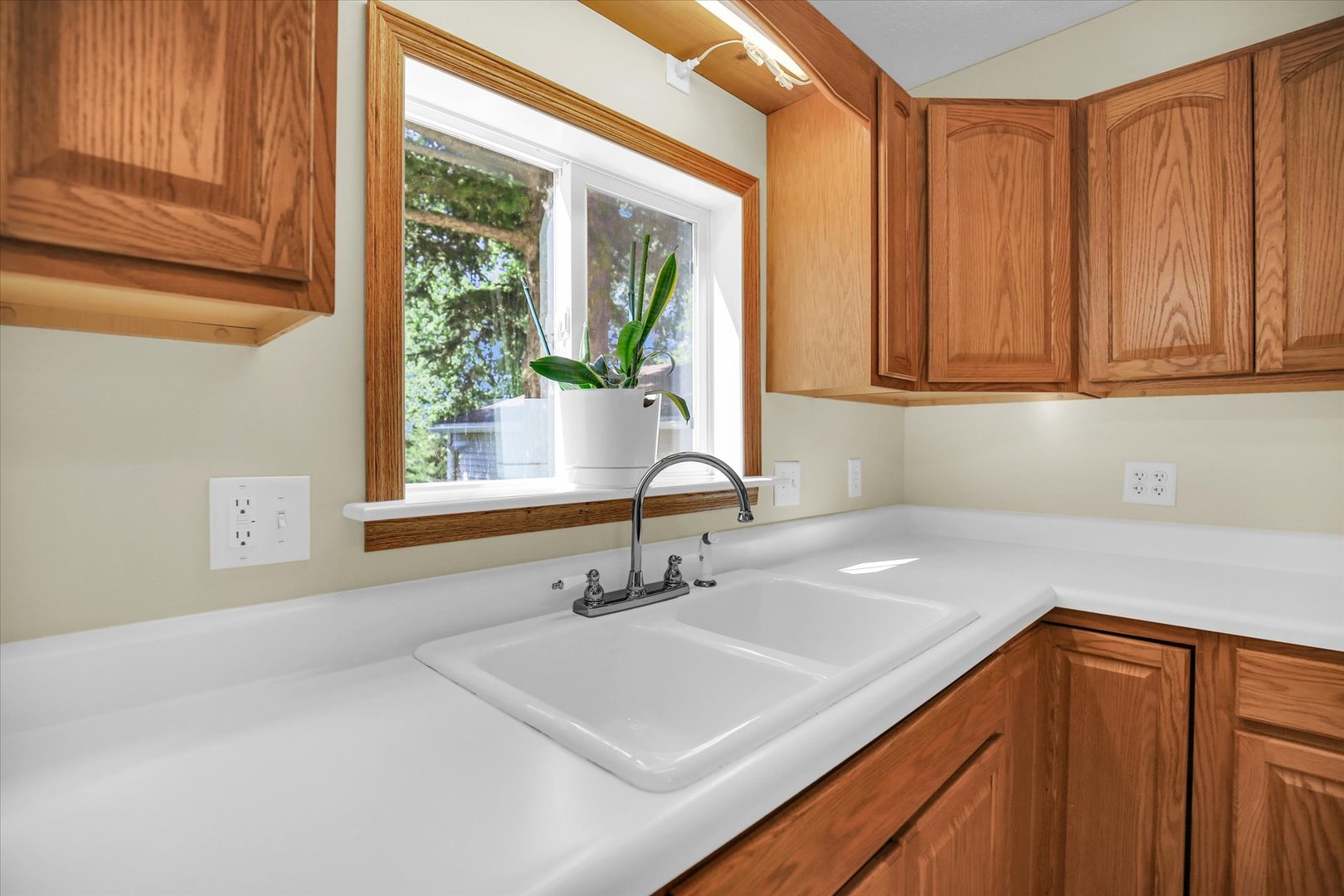 221 East 5th Avenue Rankin, IL 60960 - Photo 13 of 44 a kitchen with a sink cabinets and a window