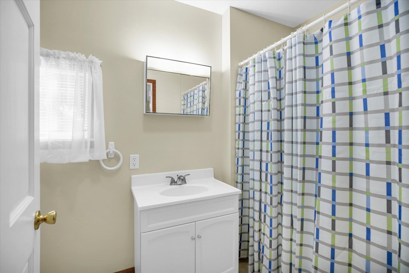 221 East 5th Avenue Rankin, IL 60960 - Photo 14 of 44 a bathroom with a sink a toilet and shower