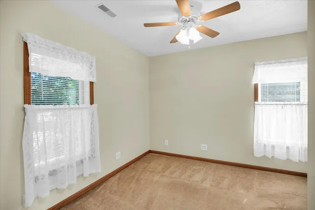 a view of a storage & utility room with a sink