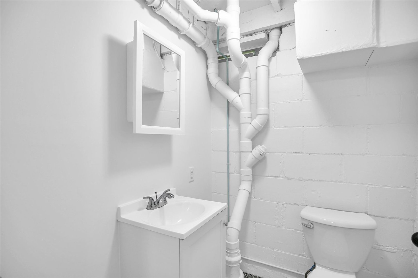 221 East 5th Avenue Rankin, IL 60960 - Photo 26 of 44 a bathroom with a sink a toilet and shower