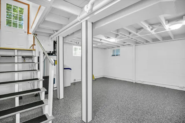 a bathroom with a sink and mirror