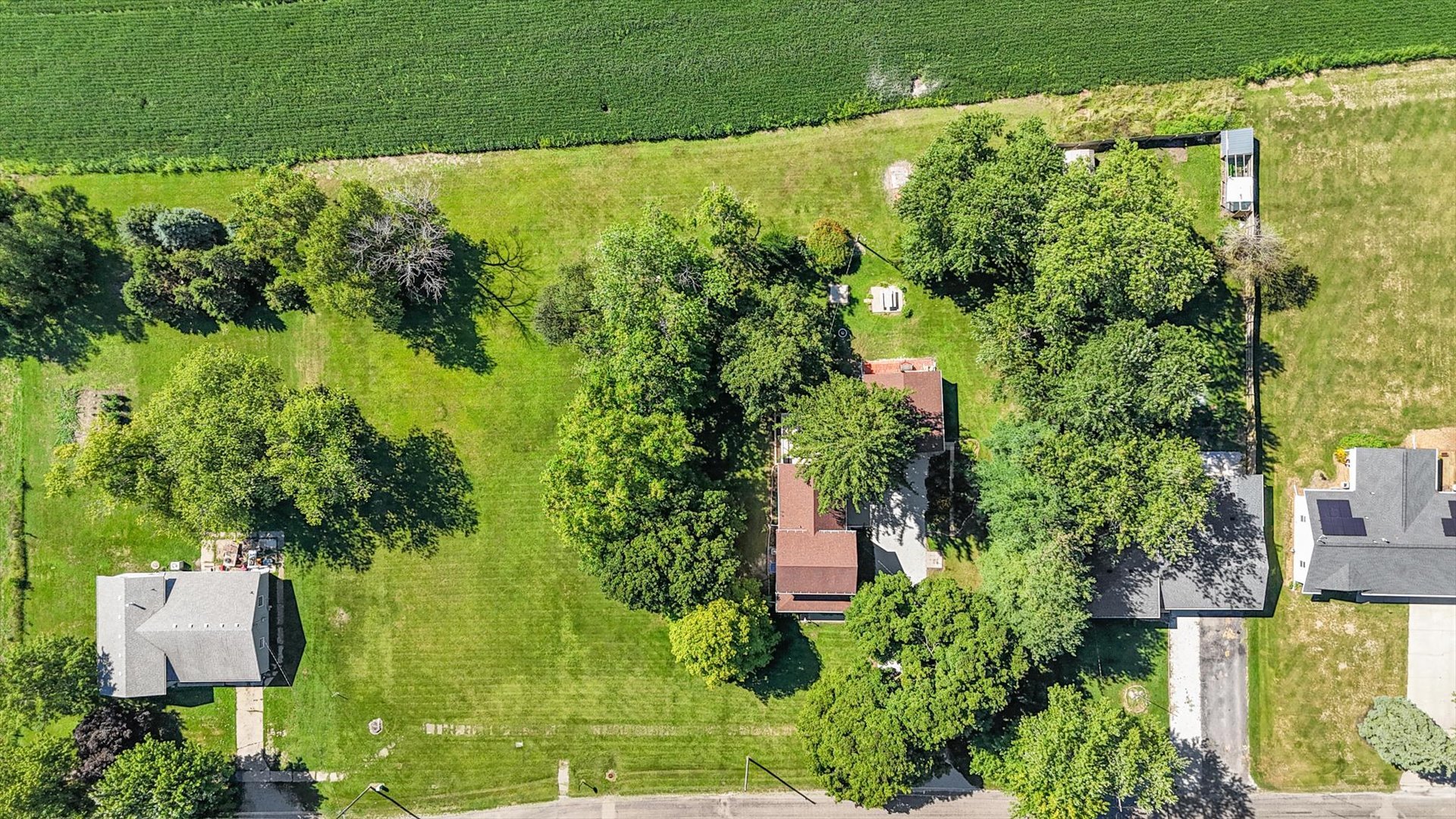 221 East 5th Avenue Rankin, IL 60960 - Photo 32 of 44 an aerial view of residential house with an outdoor space and seating