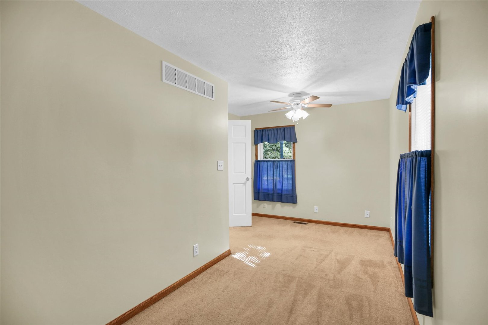 221 East 5th Avenue Rankin, IL 60960 - Photo 6 of 44 wooden floor in an empty room with a window