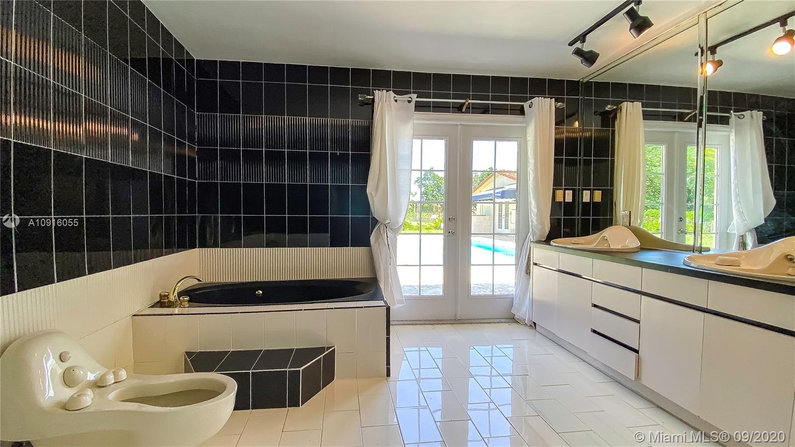 19051 Southwest 272nd Street Homestead, FL 33031 - Photo 22 of 52 Separate Tub, Shower, Dual Sinks, & Bidet