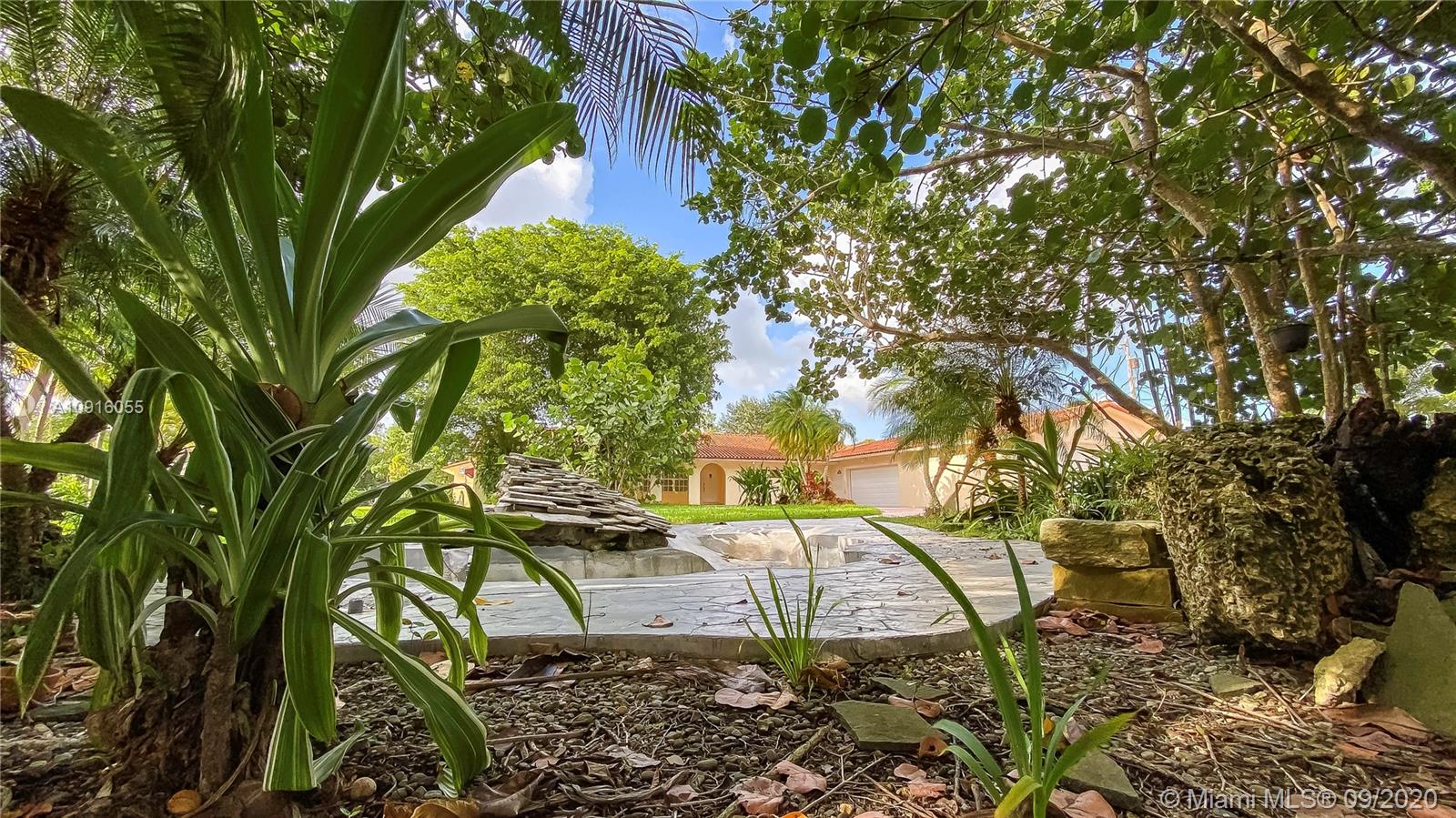 19051 Southwest 272nd Street Homestead, FL 33031 - Photo 46 of 52 Garden/Koi Pond