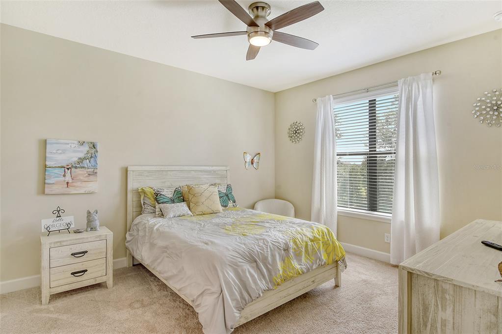 13604 Messina Loop, Unit 203 Bradenton, FL 34211 - Photo 21 of 56 a bedroom with a bed and a window