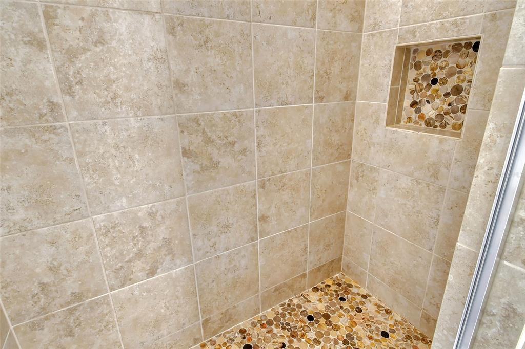 13604 Messina Loop, Unit 203 Bradenton, FL 34211 - Photo 24 of 56 a bathroom with a shower