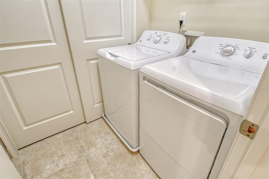 13604 Messina Loop, Unit 203 Bradenton, FL 34211 - Photo 29 of 56 a utility room with dryer and washer