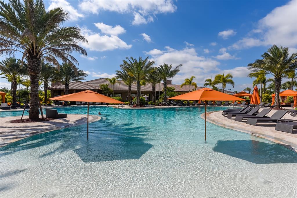 13604 Messina Loop, Unit 203 Bradenton, FL 34211 - Photo 38 of 56 an outdoor space with pool and furniture