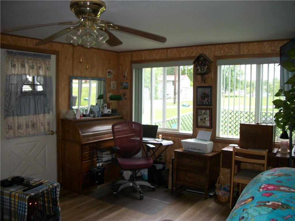 944 Mapletown Road Greensboro, PA 15338 - Photo 11 of 20 a living room with furniture and a floor to ceiling window