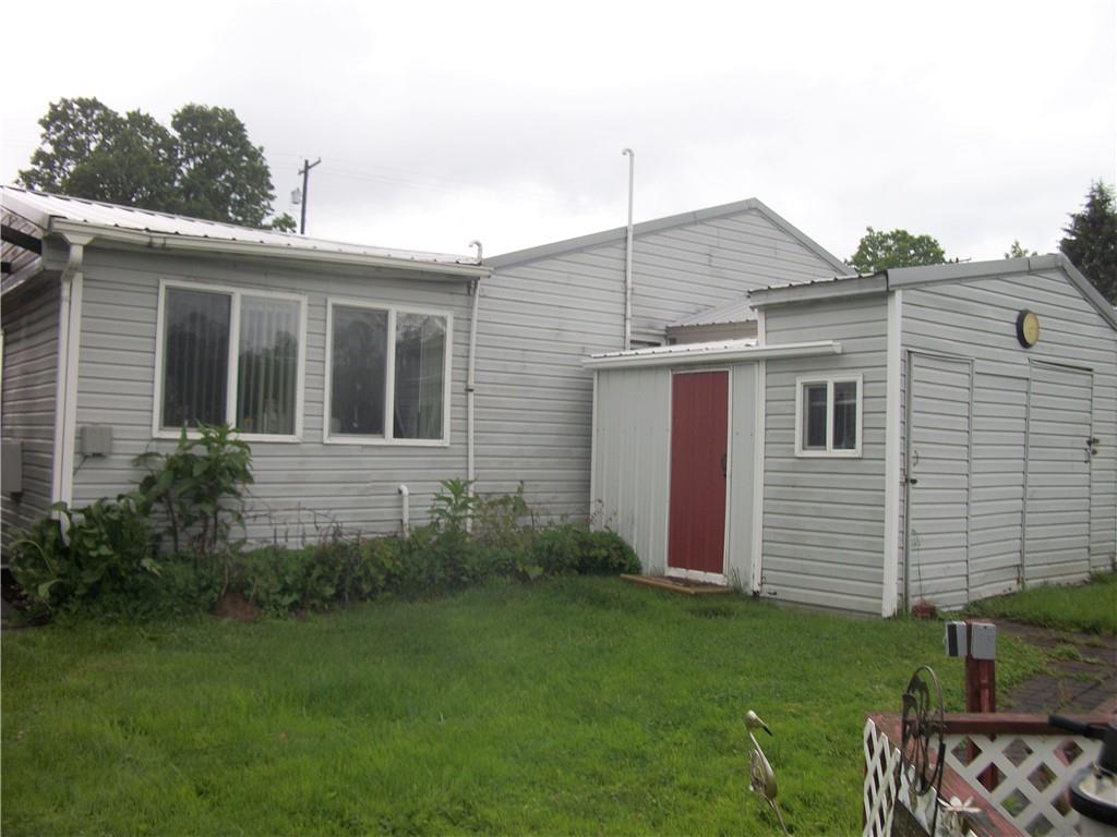 944 Mapletown Road Greensboro, PA 15338 - Photo 15 of 20 a front view of a house with garden