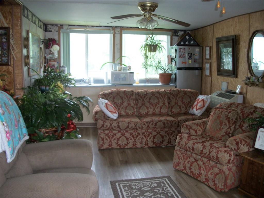 944 Mapletown Road Greensboro, PA 15338 - Photo 8 of 20 a living room with furniture and a large window