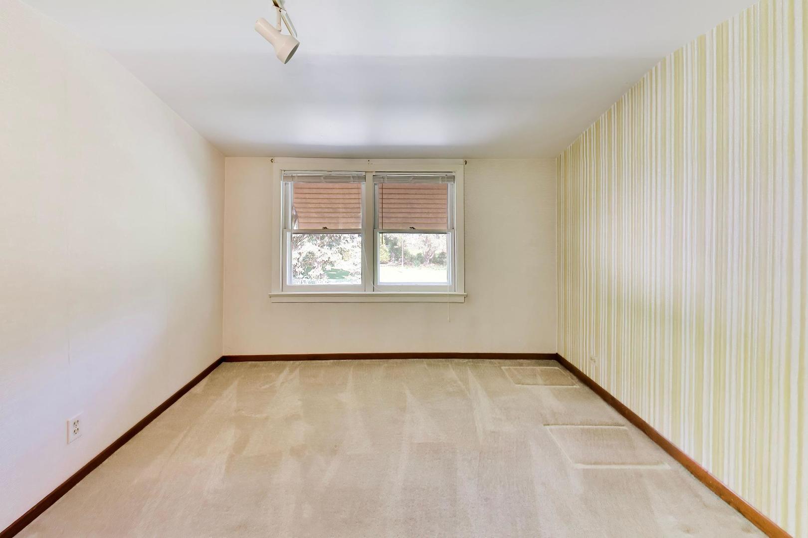 103 Cottonwood Road Northbrook, IL 60062 - Photo 28 of 50 wooden floor in an empty room with a window
