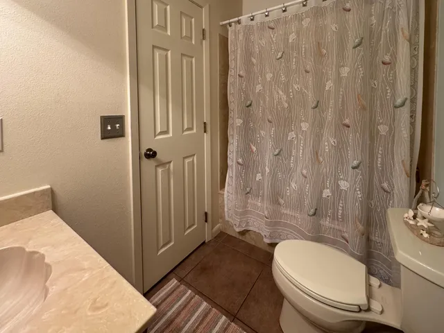 an empty room with a empty space and a window