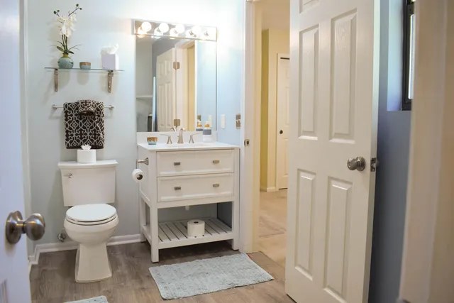 a bathroom with a toilet and a sink