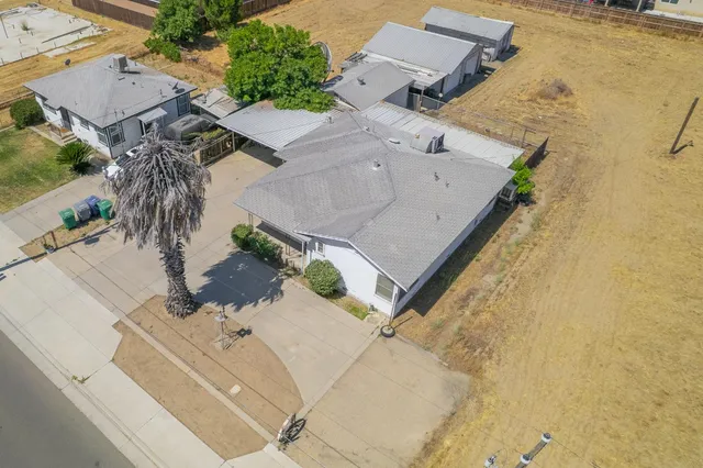 a house with trees in front of it