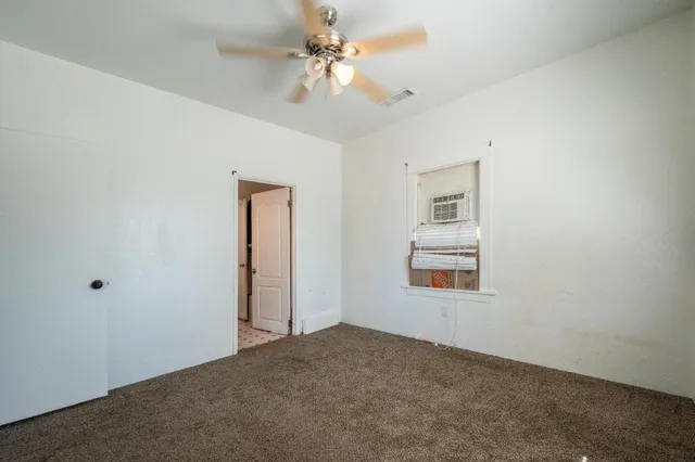 a house with trees in the background