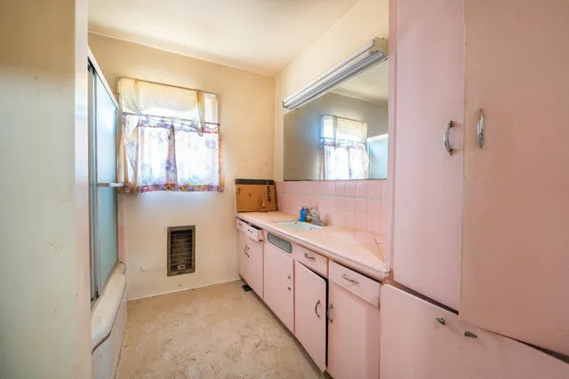 a bathroom with a shower curtain