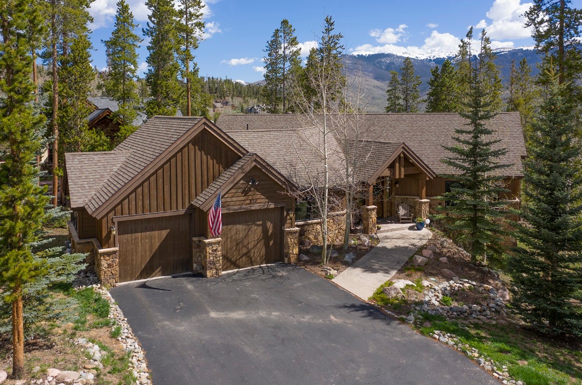 724 Willowbrook Road Silverthorne, CO 80498 - Photo 1 of 30 a view of a house with a yard and balcony
