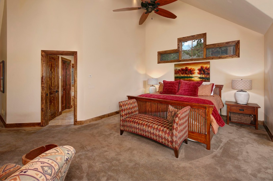 724 Willowbrook Road Silverthorne, CO 80498 - Photo 16 of 30 a bed room with a bed and a night stand