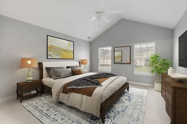 a bedroom with a bed and a couch