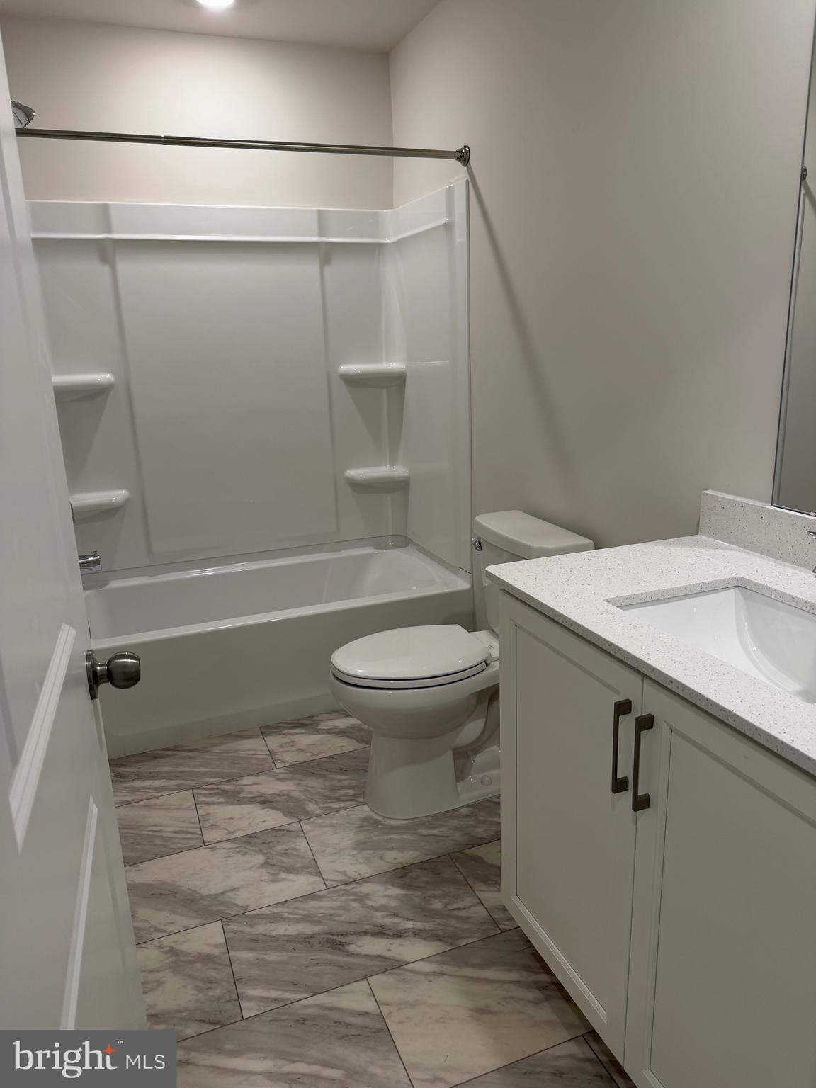 10 Barbine Way Bridgeport, PA 19405 - Photo 31 of 44 a bathroom with a granite countertop sink toilet and shower