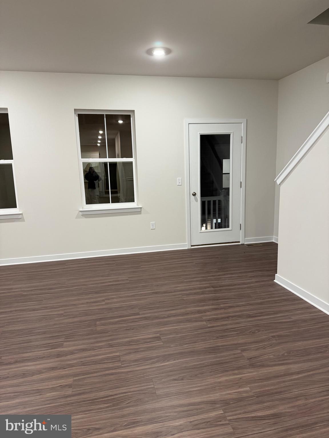 10 Barbine Way Bridgeport, PA 19405 - Photo 7 of 44 a view of an empty room with wooden floor and a window