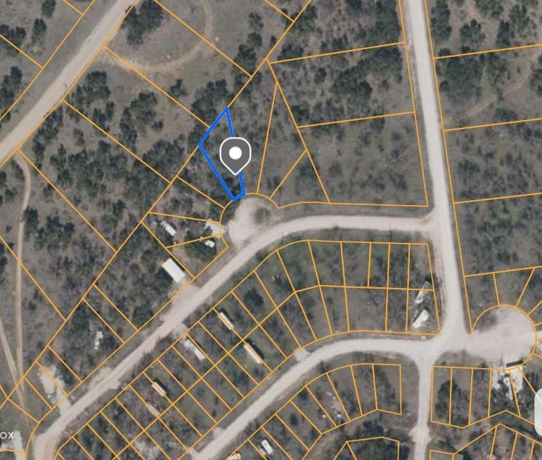 Lot 914 Oak Point Drive May, TX 76857 - Photo 2 of 3 a front view of a building