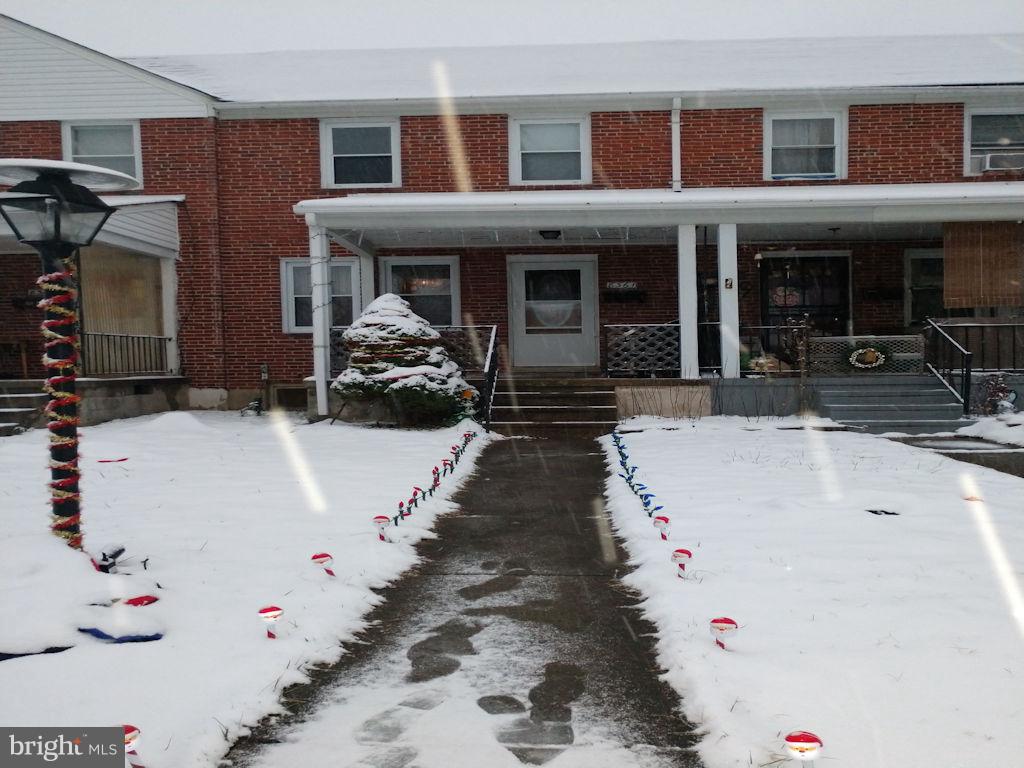 8361 Ridgely Oak Road Baltimore, MD 21234 - Photo 1 of 17 a view of a house with potted plants