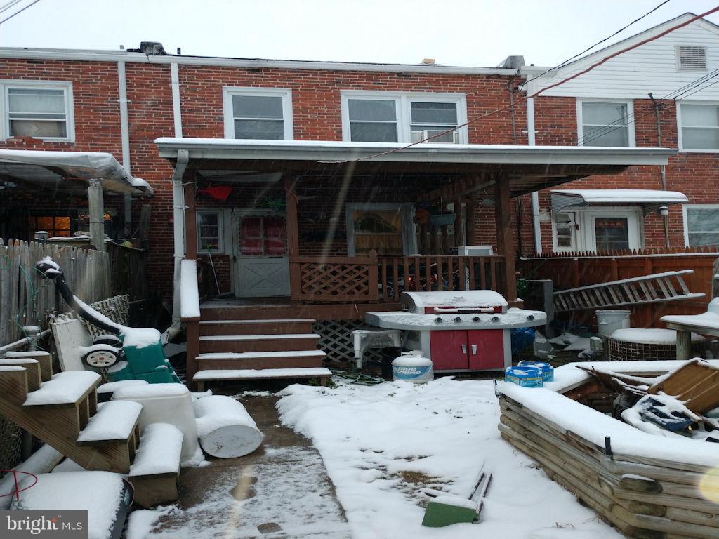 8361 Ridgely Oak Road Baltimore, MD 21234 - Photo 15 of 17 a front view of a house with outdoor seating
