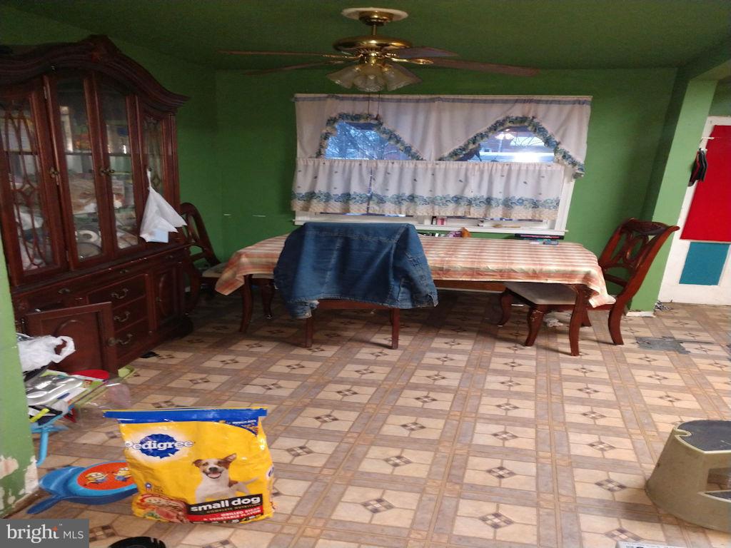 8361 Ridgely Oak Road Baltimore, MD 21234 - Photo 6 of 17 a living room with furniture and wood floor