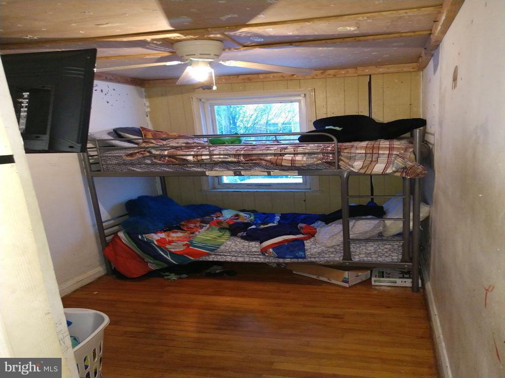 8361 Ridgely Oak Road Baltimore, MD 21234 - Photo 8 of 17 a room with wooden floors and pool table