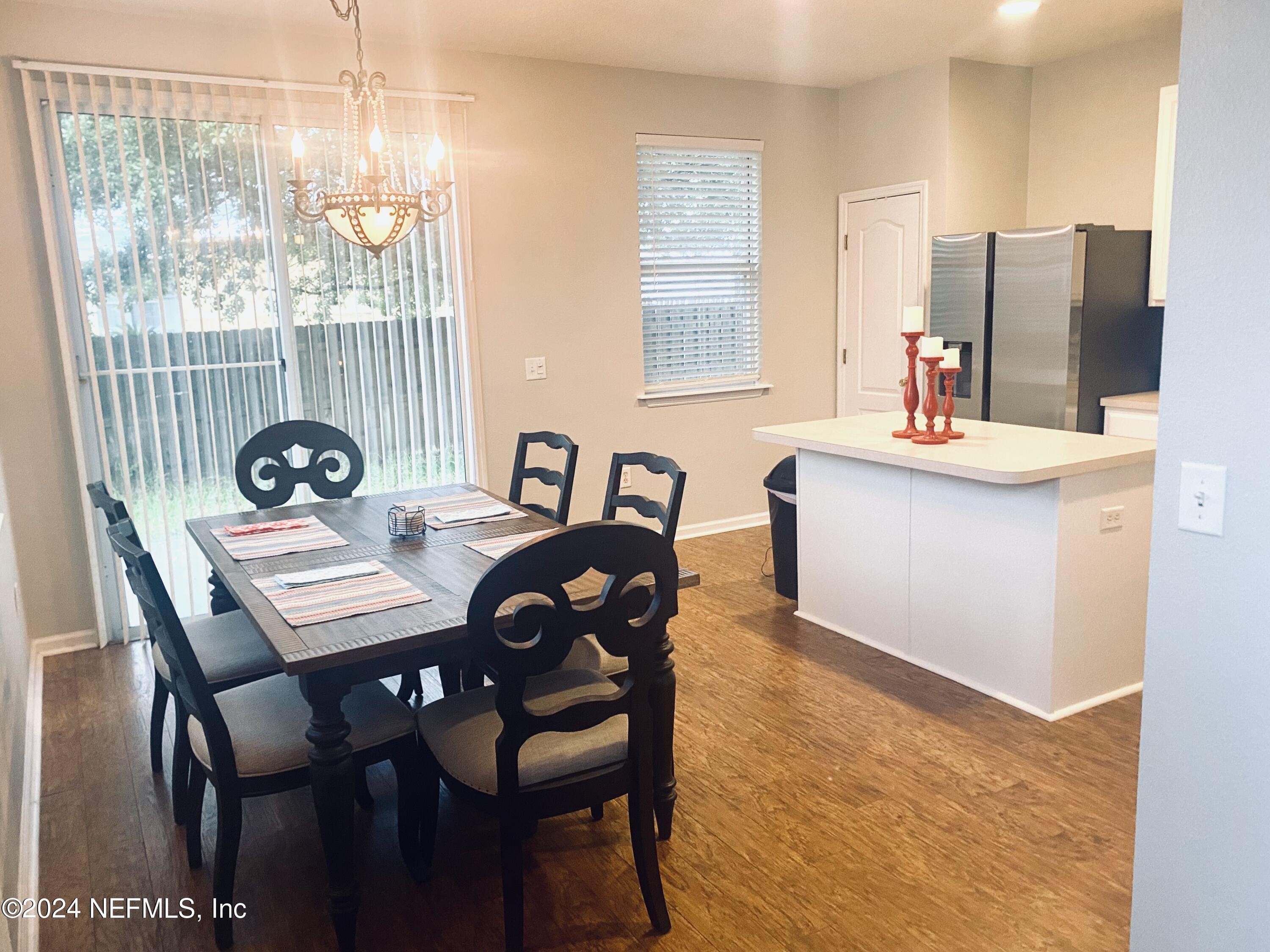 1108 Nochaway Drive St. Augustine, FL 32092 - Photo 4 of 11 a view of a dining room with furniture and a window