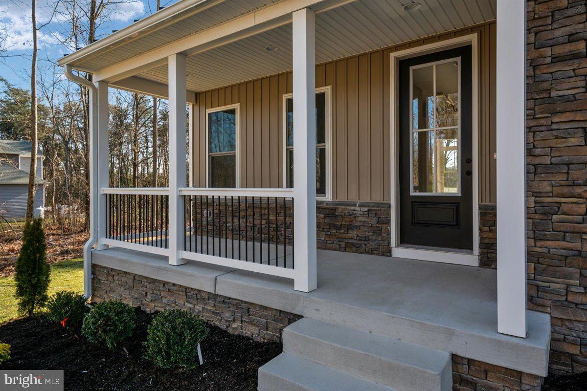 77 Magothy Beach Road Pasadena, MD 21122 - Photo 5 of 44 Metal Pickets on Porch Rails